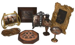 An Art Nouveau bronze dish, photograph frames and other items