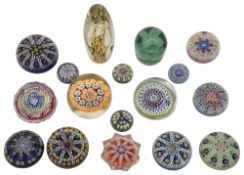 A collection of mostly millefiori glass paperweights