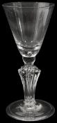 An early 18th century moulded stem wine glass c.1730