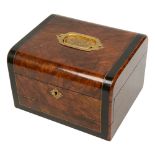 An early Victorian simulated burr walnut dressing box