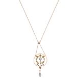 An Edwardian aquamarine and half pearl pendant & chain