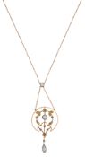 An Edwardian aquamarine and half pearl pendant & chain