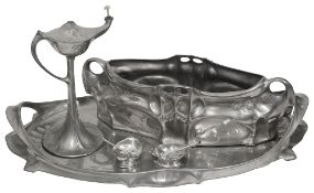 Art Nouveau pewter items to include a tray and planter