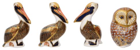 A group of four First Edition Royal Crown Derby paperweights