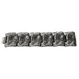 Robert Larin. A 1970s Brutalist textured silver plated pewter panel bracelet