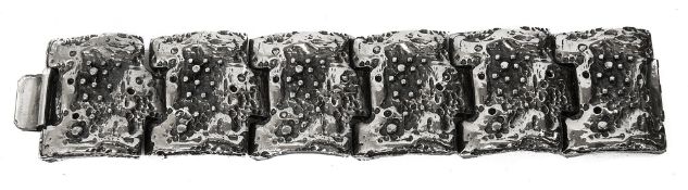 Robert Larin. A 1970s Brutalist textured silver plated pewter panel bracelet