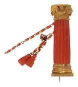 A mid 19th century coral and yellow gold column brooch