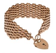 A 9ct gold six bar gate bracelet