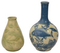 A C.H. Brannam pottery vase and another Brannam example
