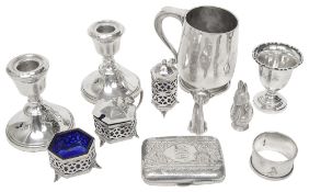 A George V silver cruet set, a christening mug and other silver