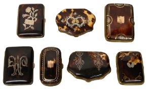 A group of seven tortoiseshell and pique work purses