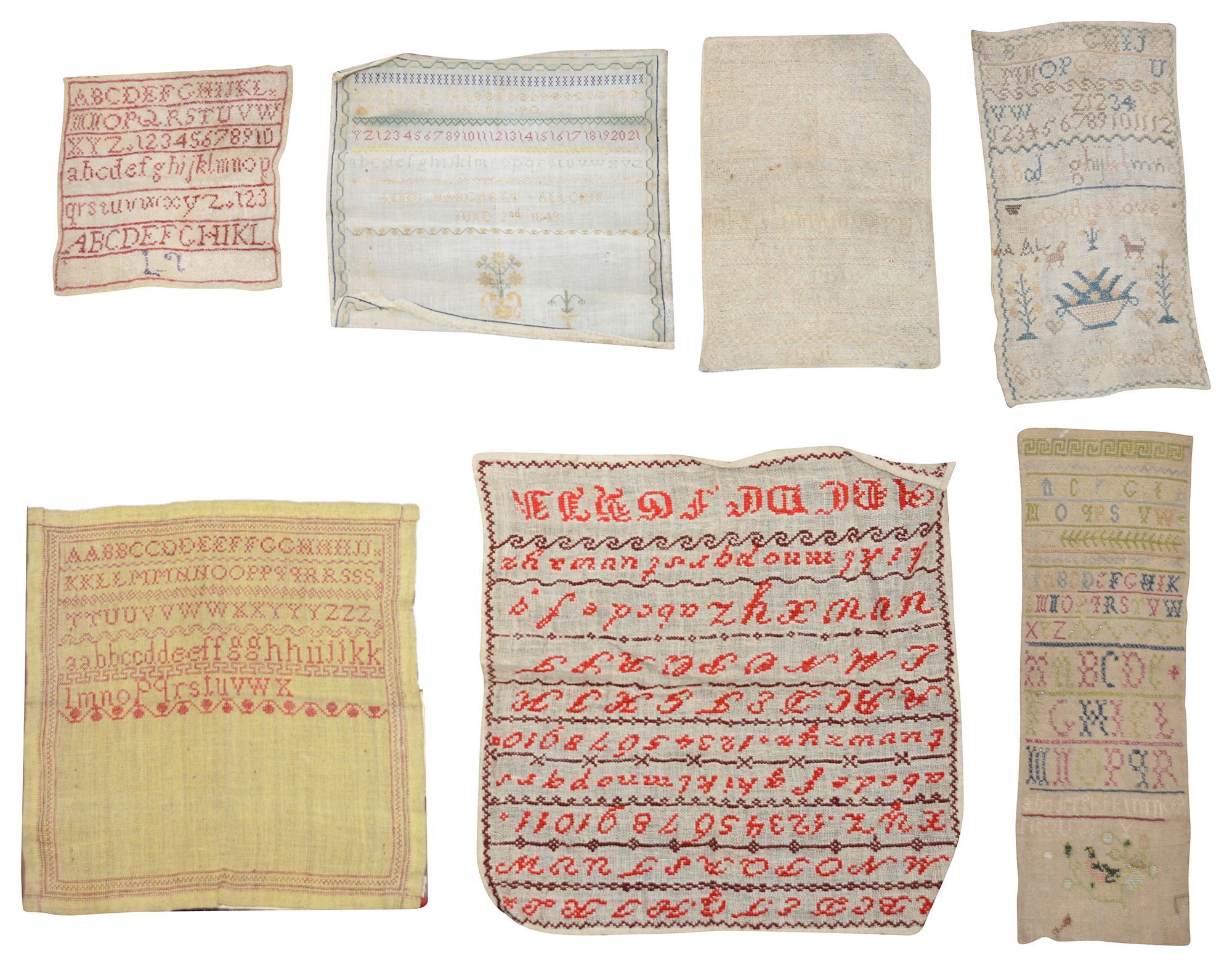 Six 19th century embroidered alphabet samplers