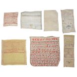 Six 19th century embroidered alphabet samplers