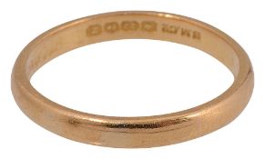A 22ct yellow gold wedding band,
