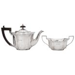 A George V silver bachelors teapot and a sugar bowl