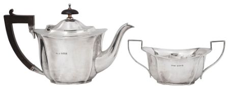 A George V silver bachelors teapot and a sugar bowl