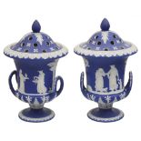 A pair late Wedgwood jasperware pot pourri urns and covers