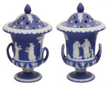 A pair late Wedgwood jasperware pot pourri urns and covers