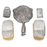 A silver hand mirror, a card case and other items