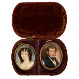 Early 19th century School. A cased pair of portrait miniatures c.1830