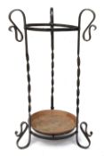 An Arts and Crafts wrought iron and copper stick / umbrella stand