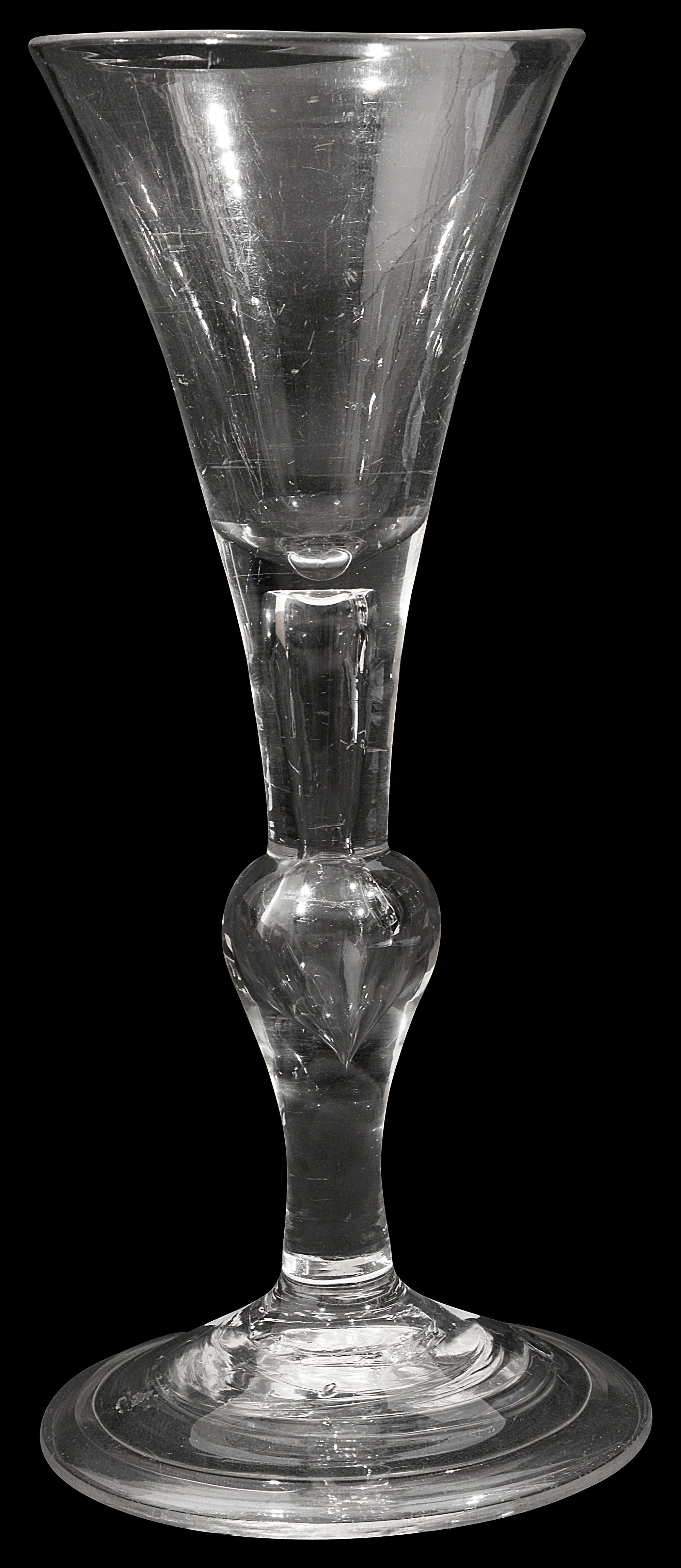 A mid 18th century balustroid wine glass of 'Kit Kat type' c.1750