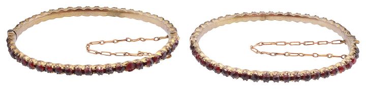 A pair of Victorian Bohemian garnet set bangles