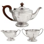 A George V silver three piece tea service