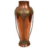 A WMF Art Nouveau tall hammered copper and brass vase c.1905