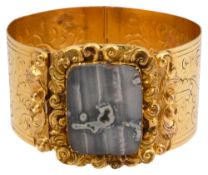 A mid 19th century hardstone and gilt metal hinged cuff bracelet