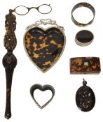 A group of six tortoiseshell pieces and a silver pin cushion
