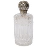 An Edwardian silver topped glass perfume bottle