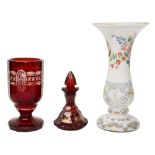 A ruby glass table scent, a vase and a 'spa' glass