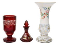 A ruby glass table scent, a vase and a 'spa' glass