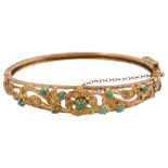 A 9ct yellow gold hinged and turquoise-set bangle