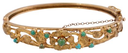 A 9ct yellow gold hinged and turquoise-set bangle