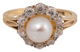 A pearl and diamond-set cluster ring