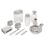 A silver matchbox cover, pair of pill boxes and other silver