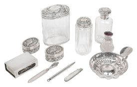 A silver matchbox cover, pair of pill boxes and other silver