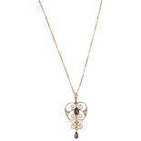 An Edwardian amethyst and half pearl pendant and chain