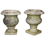 A pair of French marble urns