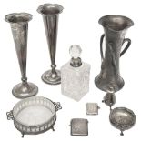 A silver three handled vase, a pair of spill vases, other silver