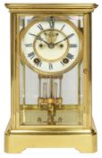 An early 20th century Ansonia lacquered brass four glass mantle clock