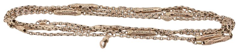 An Edwardian 9ct gold fancy link long guard chain