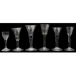 Six mid 18th century plain stem wine glasses