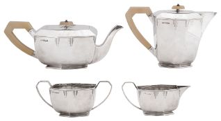 A George VI Art Deco silver and ivory four piece tea service