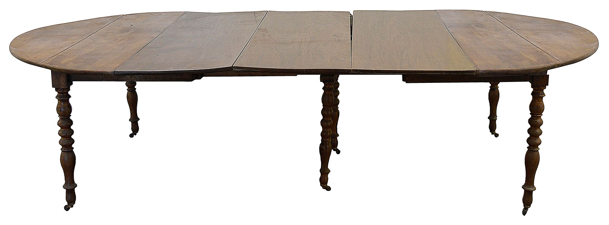 A French Provincial walnut extending dining table