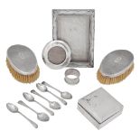 An Edwardian silver cigarette box, 2 brushes, 6 spoons, 2 frames (13)