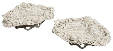 A pair of biscuit porcelain baskets