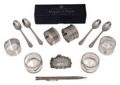 Assorted silver napkin rings and other silver